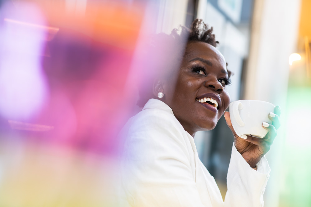 woman drinking a café in Paris