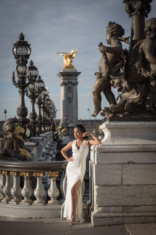 woman posing on Alexander III bridge