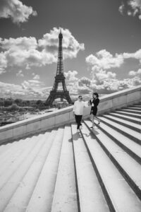 couple walking on the stairs at Trocadero