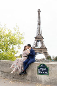Romantic couple posing in front of the Eiffel Tower